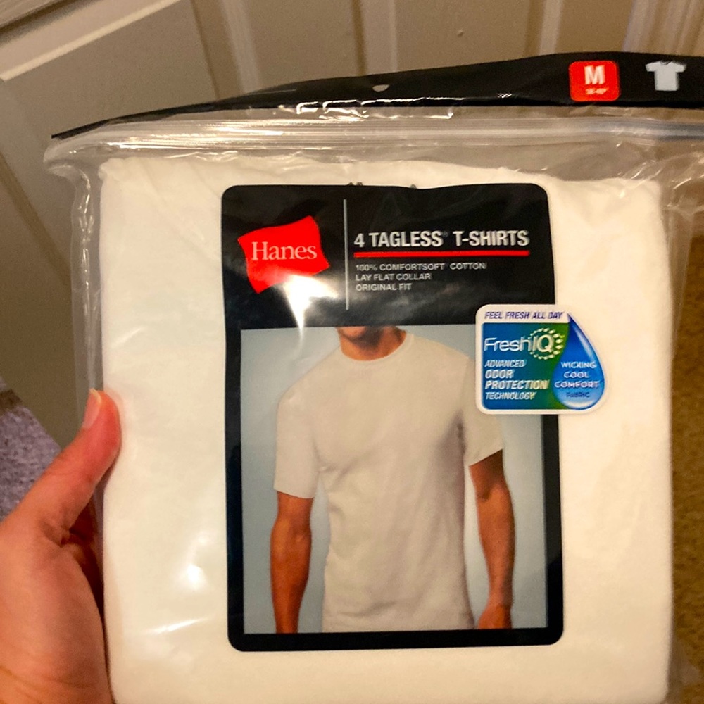 Hanes tagless shirt. 4 count  Medium